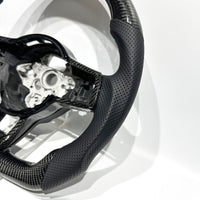 Volante de fibra de carbono Volkswagen Golf MK7 línea azul - vista angular