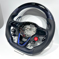 Volante de fibra de carbono Volkswagen Golf GTI Drive Select - vista angular