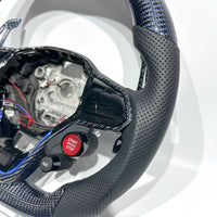 Volante de fibra de carbono Volkswagen Golf GTI Drive Select - detalle