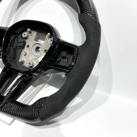 Volante de fibra de carbono BMW M3/CS, detalle